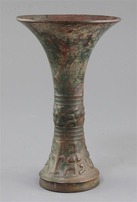 A Chinese archaic bronze ritual wine vessel, Gu, late Shang dynasty, 12th-11th century B.C., probably Anyang, 21.5cm high